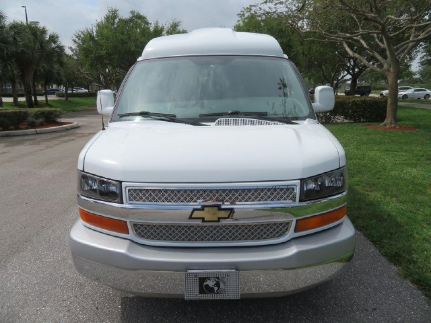 2010 White /Gray Chevrolet Express (1GNUGCD48A1) , located at 4301 Oak Circle #19, Boca Raton, FL, 33431, (954) 561-2499, 26.388861, -80.084038 - You are looking at a Gorgeous 2010 Chevy Express Handicap Wheelchair Conversion Van Explorer Limited SE with 31K Original Miles, Braun Century 750lb Side Entry Wheelchair lift, Tie Down System in the Floor, Rear Entertainment with Flat Screen TV/DVD, Leather Interior, Rear Power Folding Bench Seat/b - Photo#10